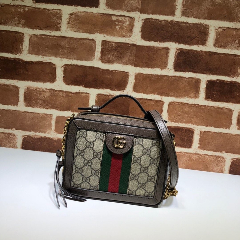 G*u*i cosmetic bags